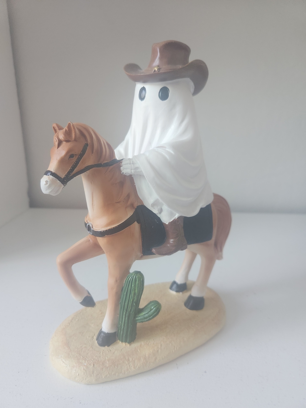 Ghost Cowboy Riding A Horse Figurine - White and Brown Western Decor Resin